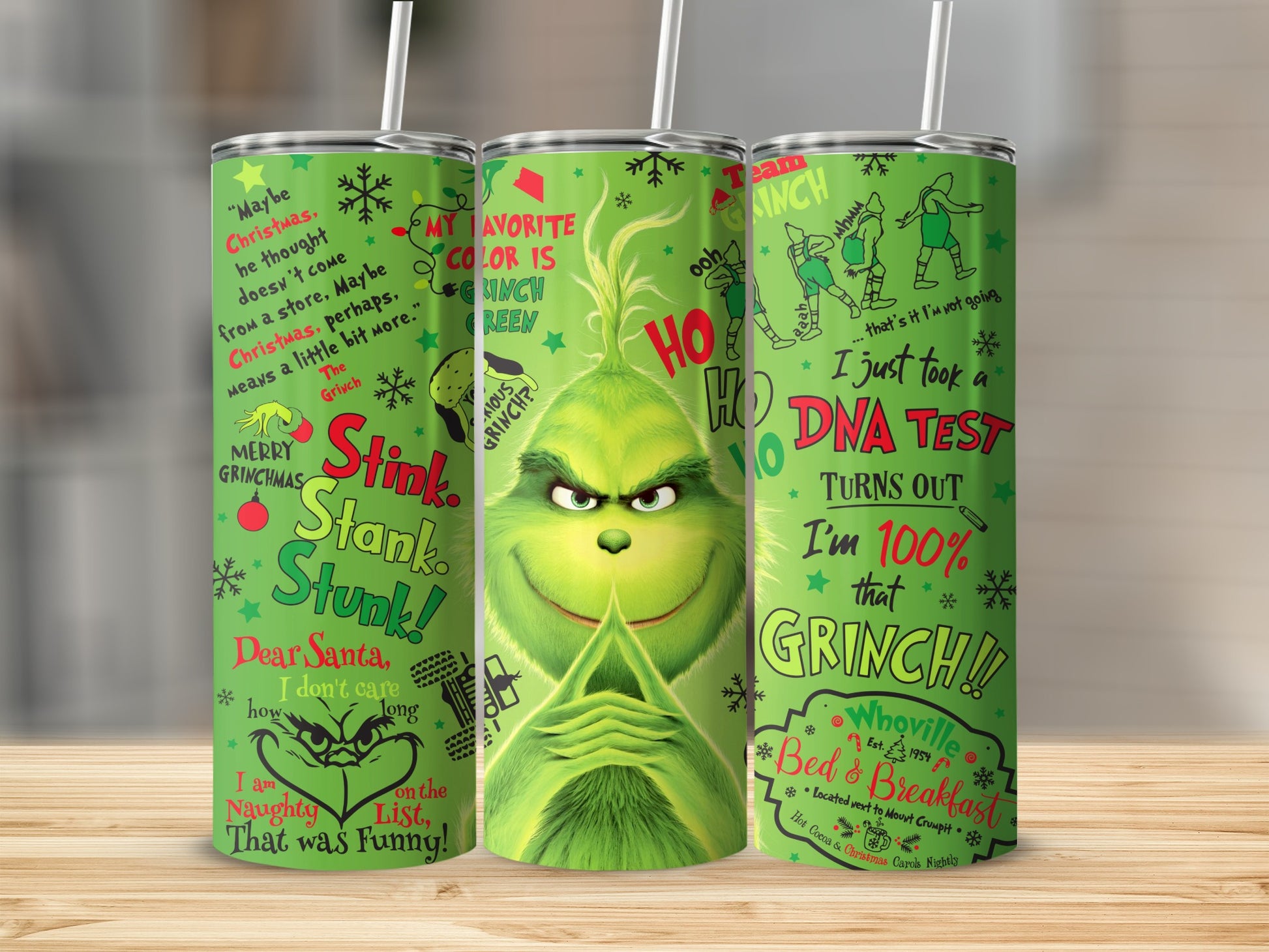 The Grinch themed tumbler with lyrics and illustrations from the movie.