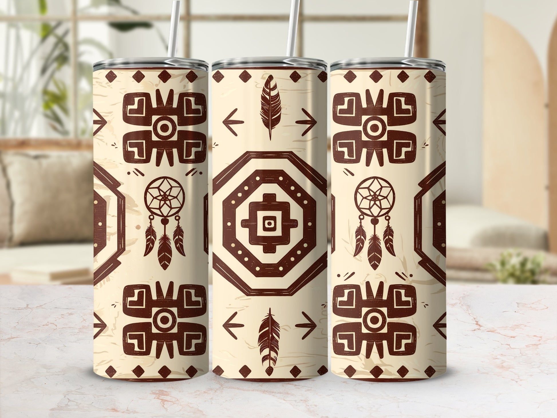 Three tumblers with a brown geometric and feather pattern on a light background.