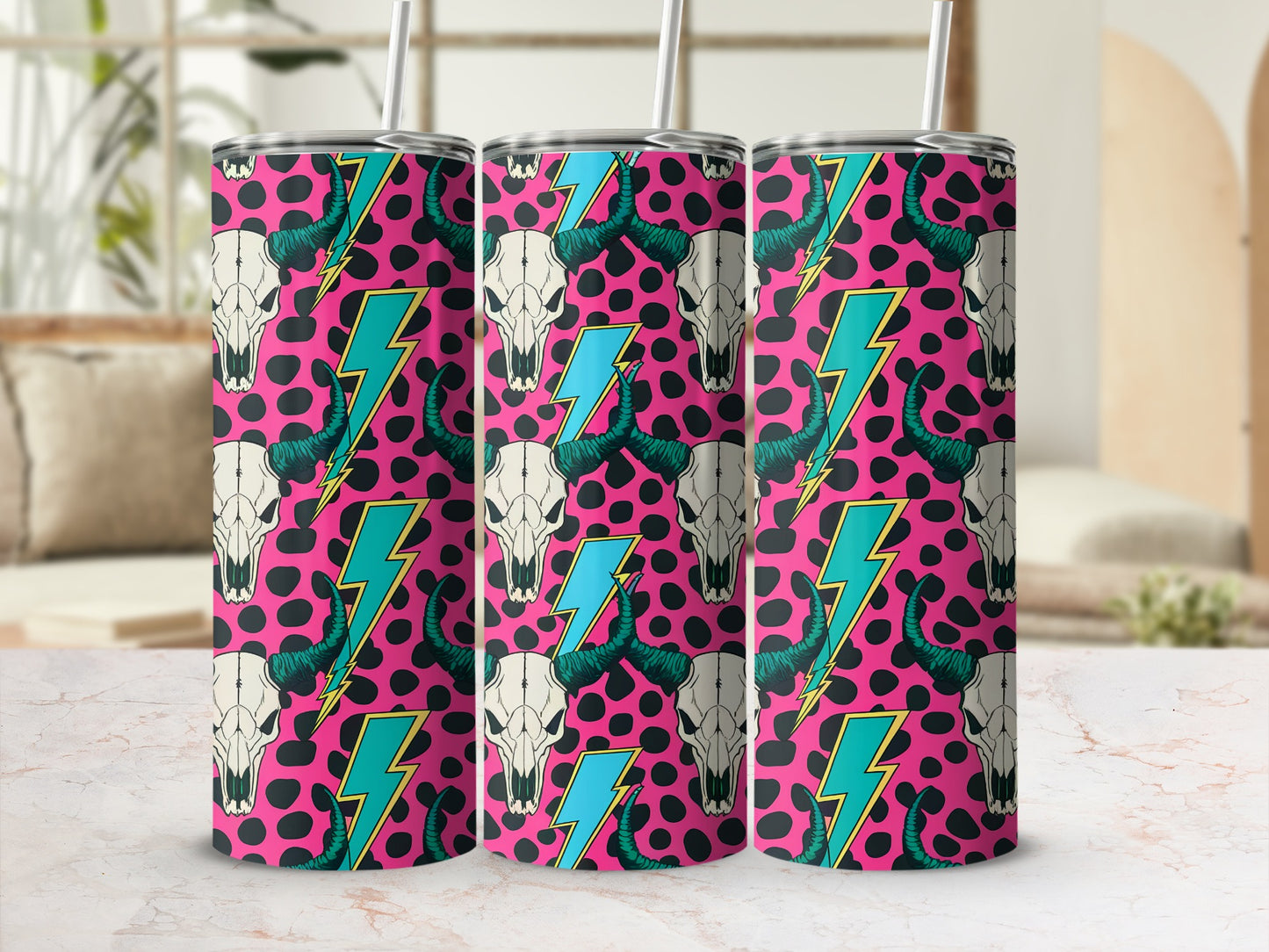 Three tumblers with a pink background featuring skulls and teal lightning bolts.