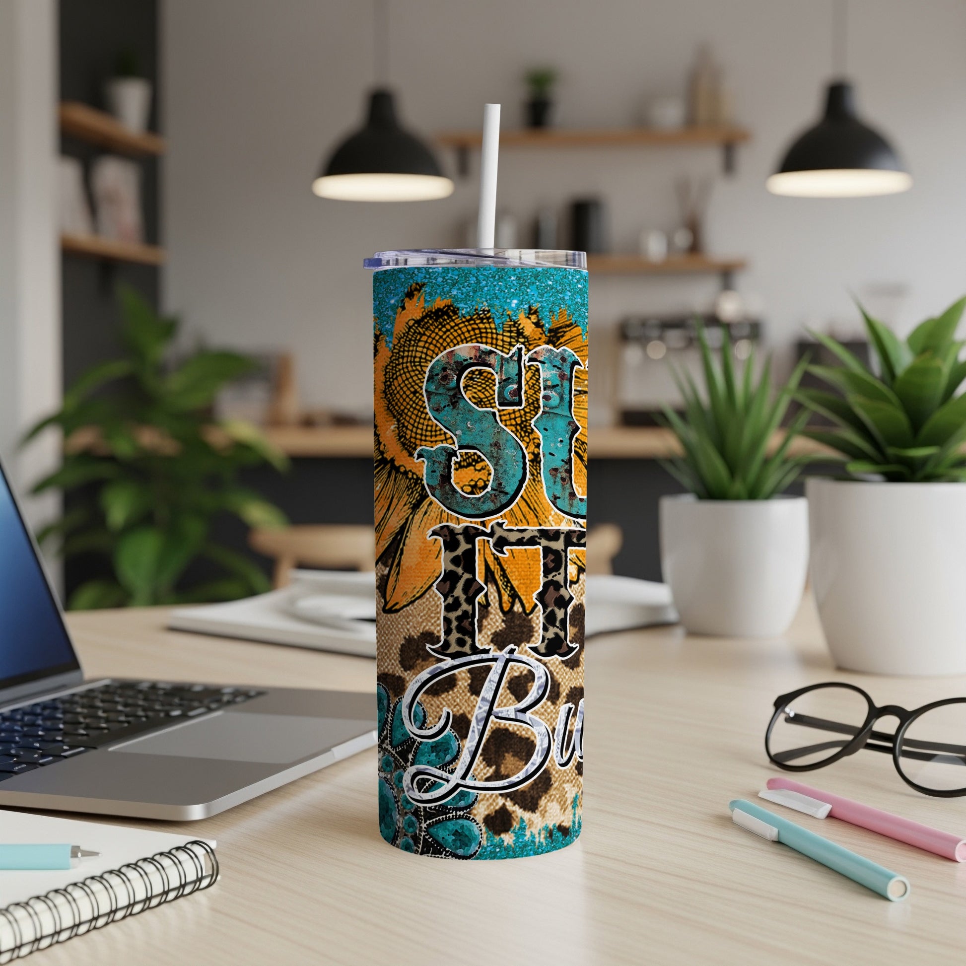 Sunflower and leopard print tumbler with "She Believed" text.