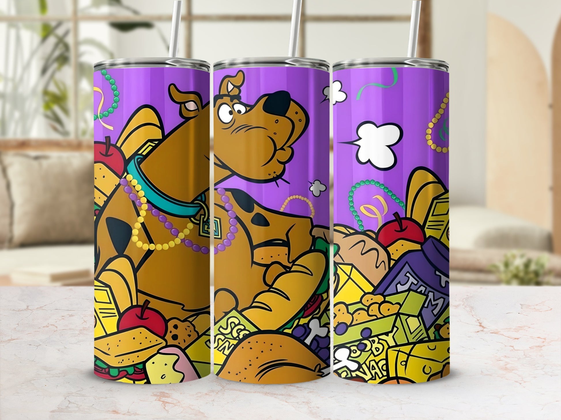 Scooby-Doo design on three tumblers with cartoon food and Mardi Gras beads.