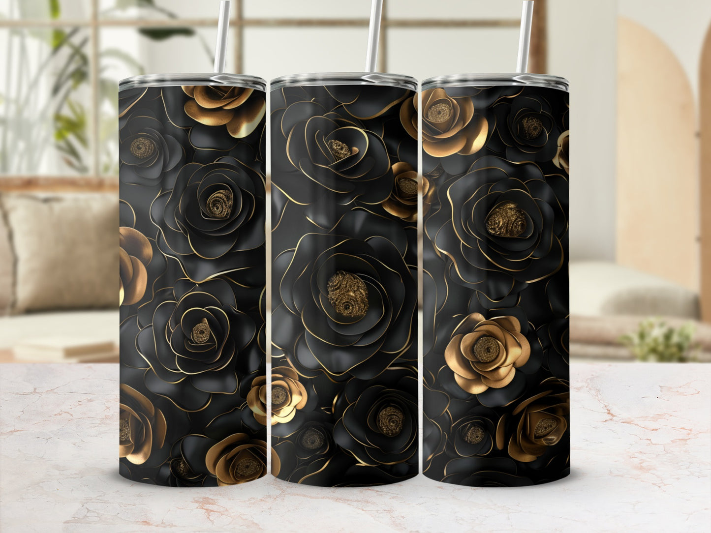 Black and gold floral pattern on three tumblers with straws.