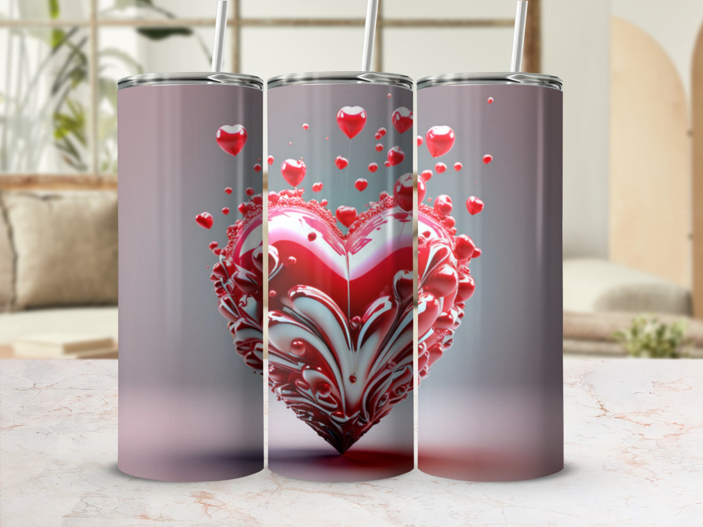3D heart design on a pink and white patterned skinny tumbler with a straw.