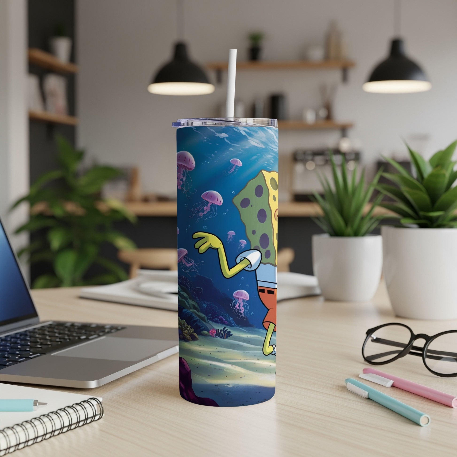 SpongeBob SquarePants character on a blue tumbler with underwater scene.