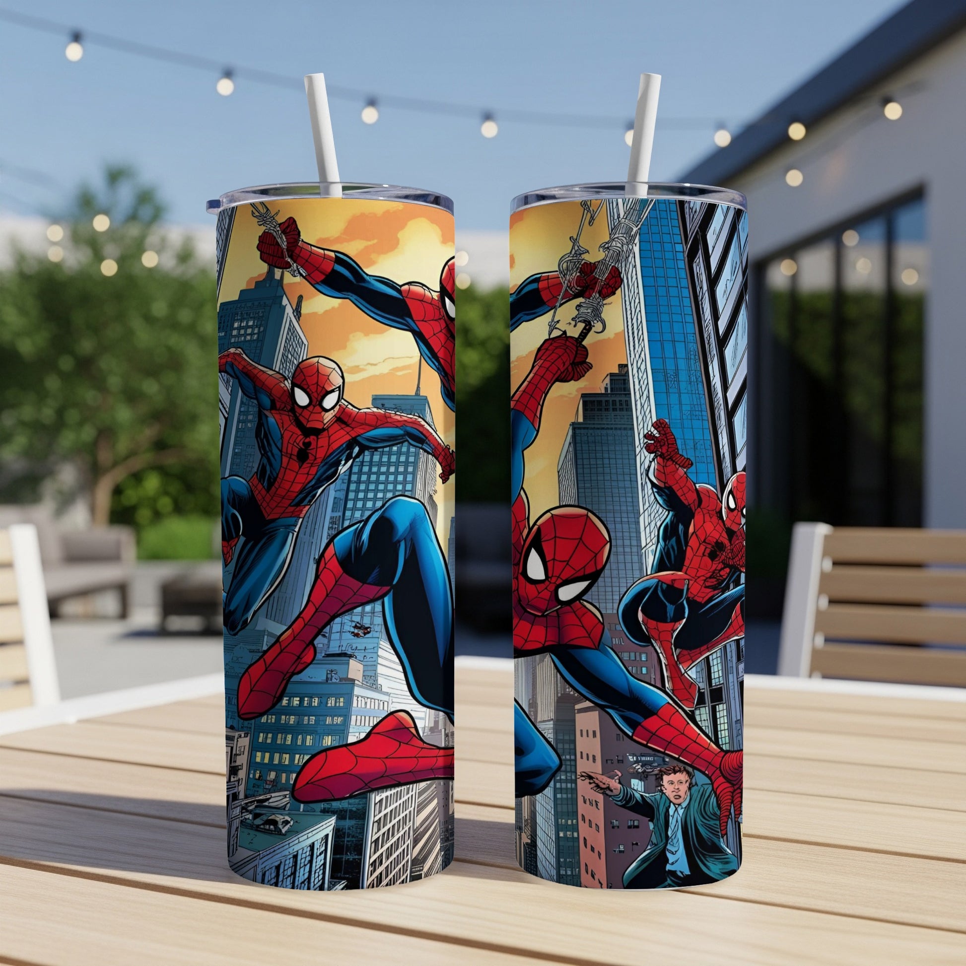 Spider-Man swinging through city buildings on a blue and red patterned tumbler.