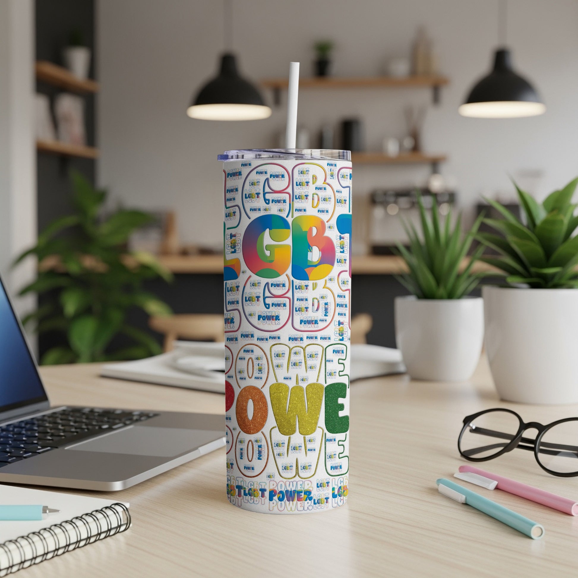 Tumbler with rainbow "LGBT POWER" text repeating on a white background.