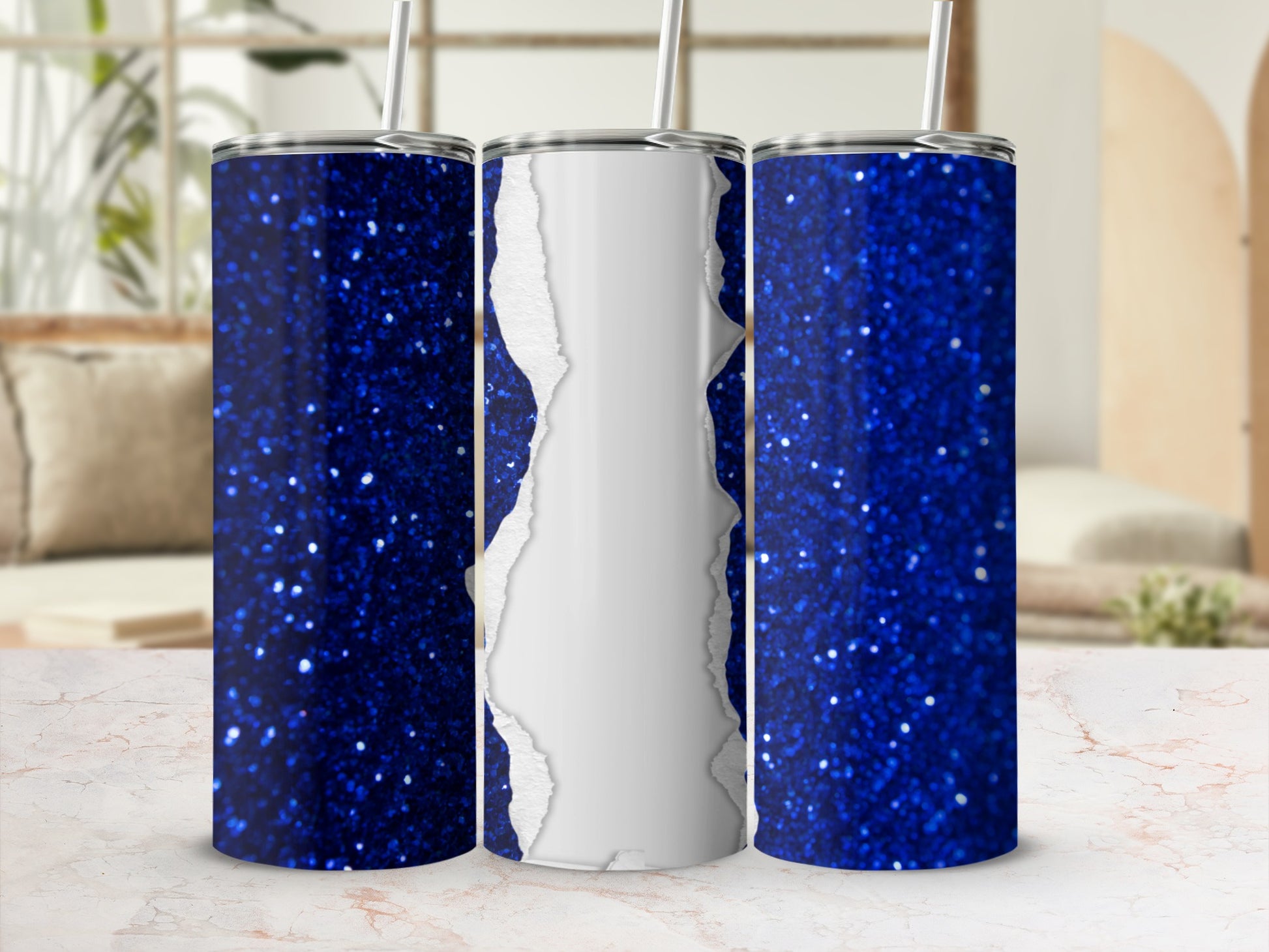 Three blue glitter tumblers with torn white paper texture.