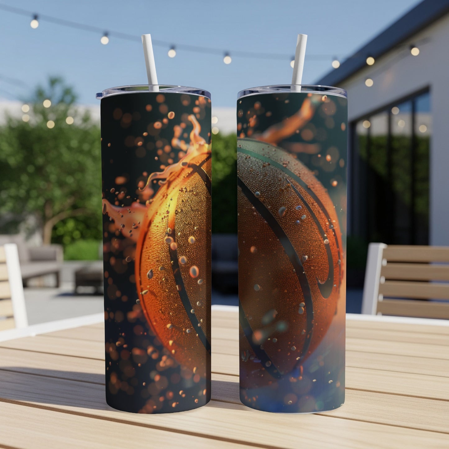 Two skinny tumblers with basketball graphic and water droplets.