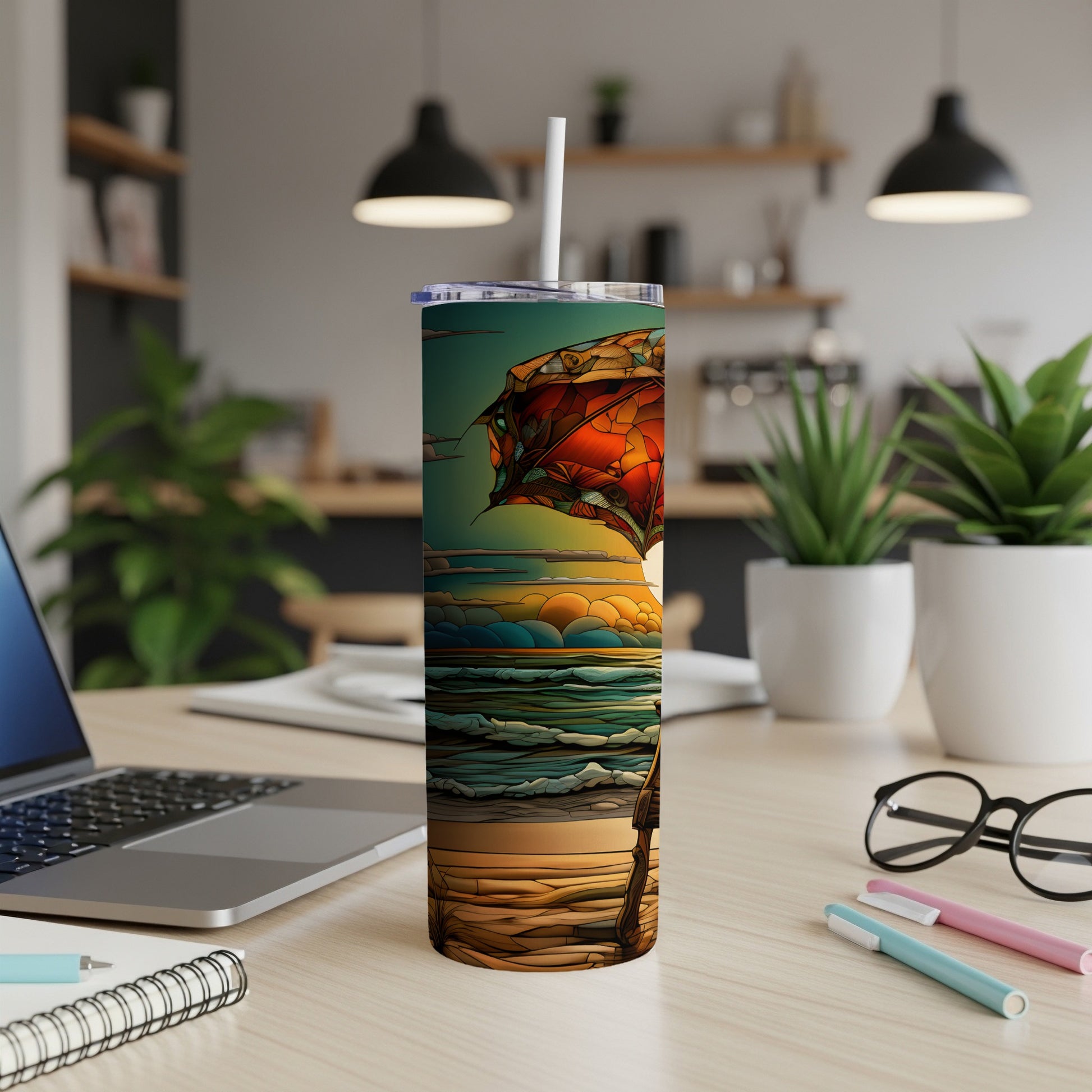 Tall tumbler with a colorful beach scene featuring a person and umbrella.