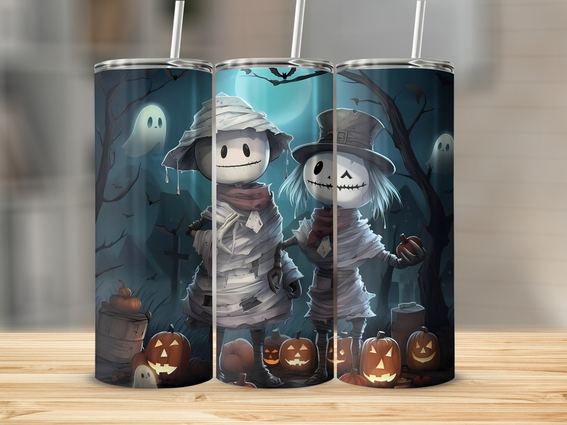 Halloween tumbler with mummy and skeleton characters, pumpkins, and ghosts.