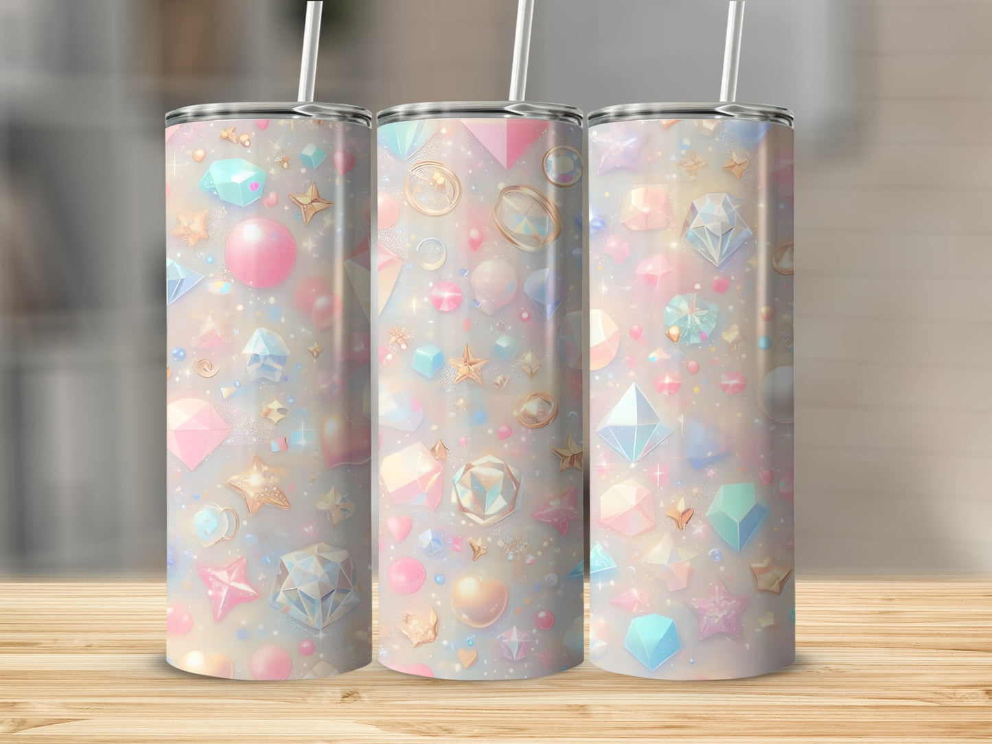 Three iridescent tumblers with jewel and star patterns on a wooden surface.
