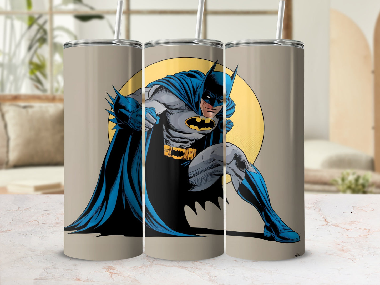 Batman in a crouched pose on a beige tumbler.
