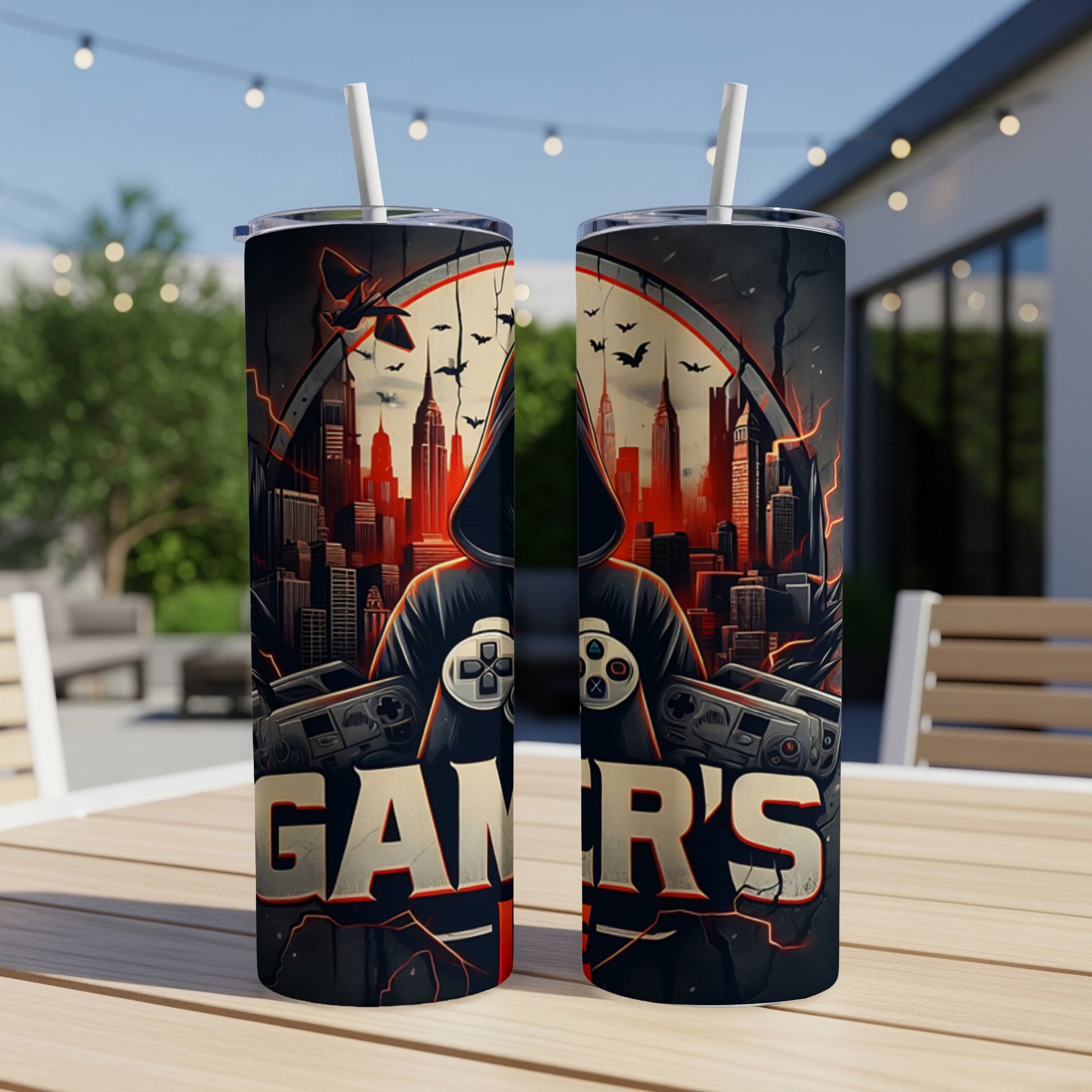 Two tumblers with "GAMER'S LIFE" and city skyline design.