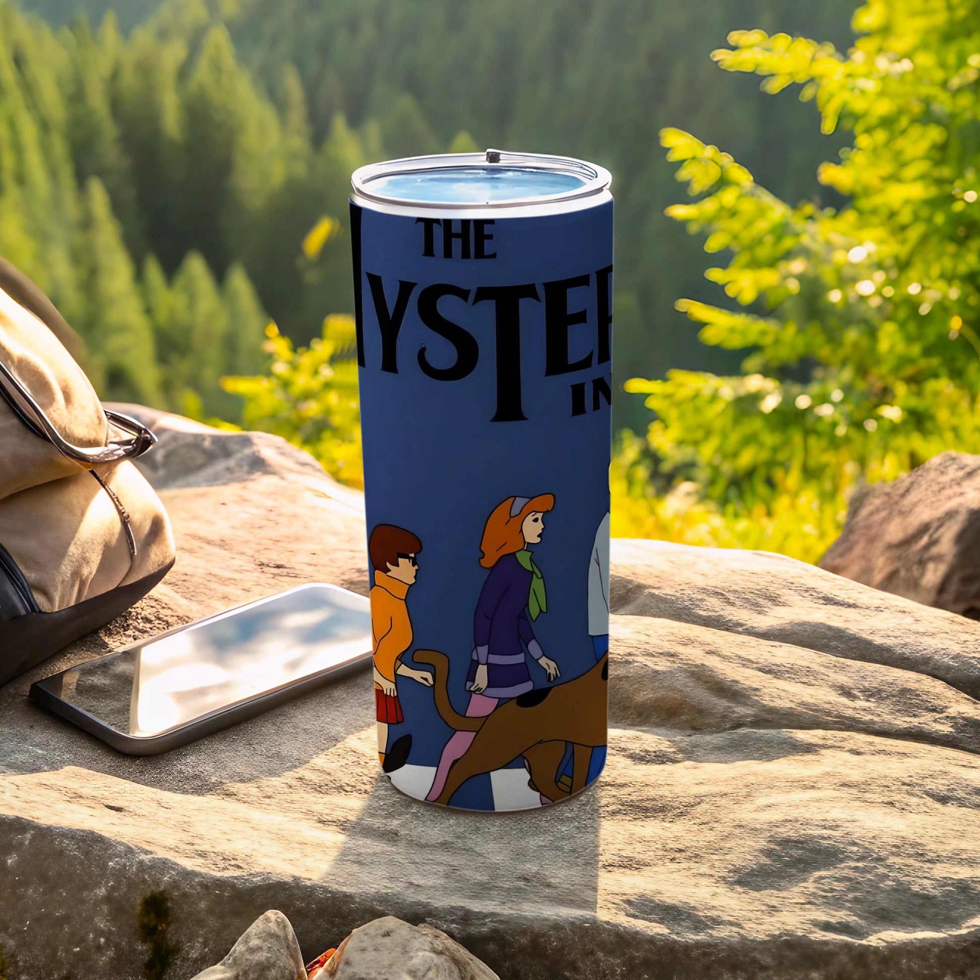 Scooby-Doo characters on a blue tumbler with "The Mystery Inc." text.