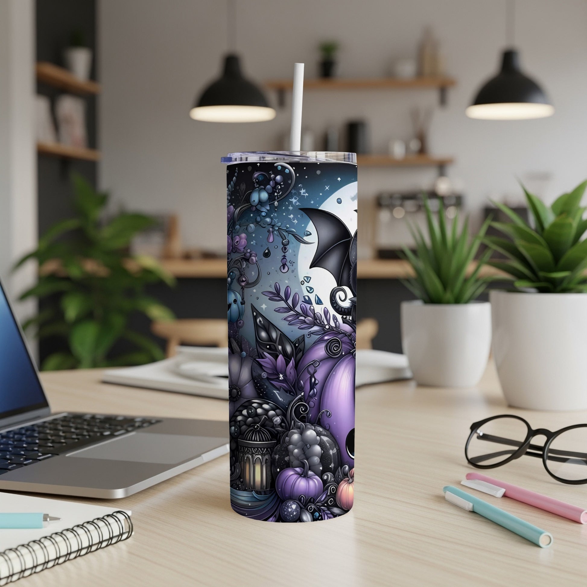 Halloween themed tumbler with pumpkins, bats, and a moon on a dark, starry background.