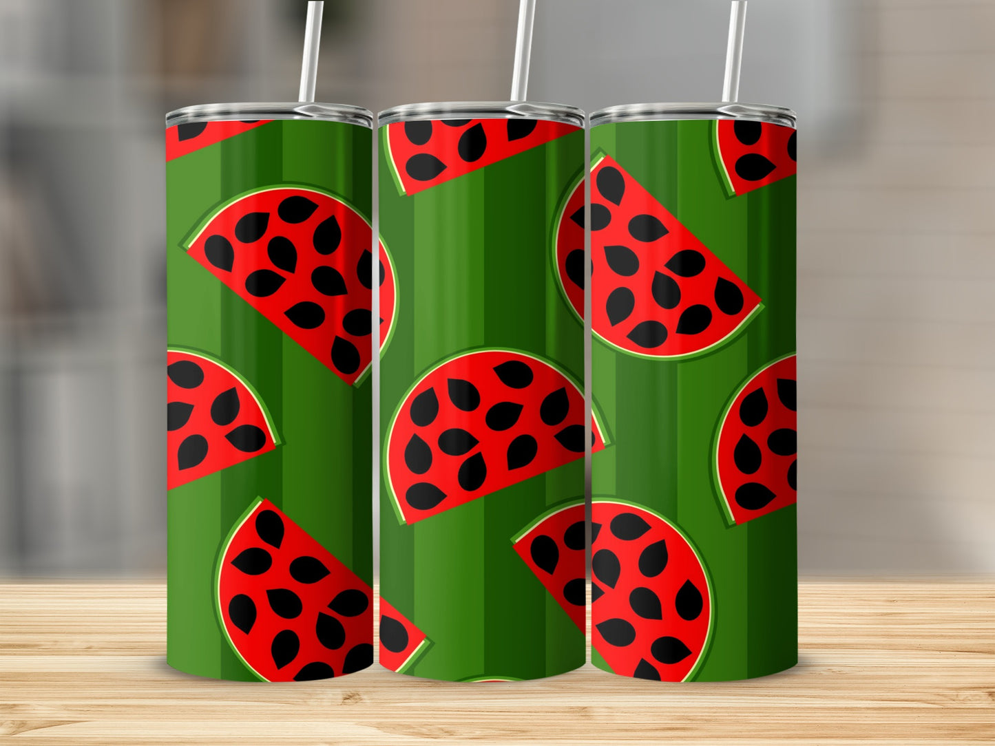 Green tumbler with repeating watermelon slice pattern and white straws.