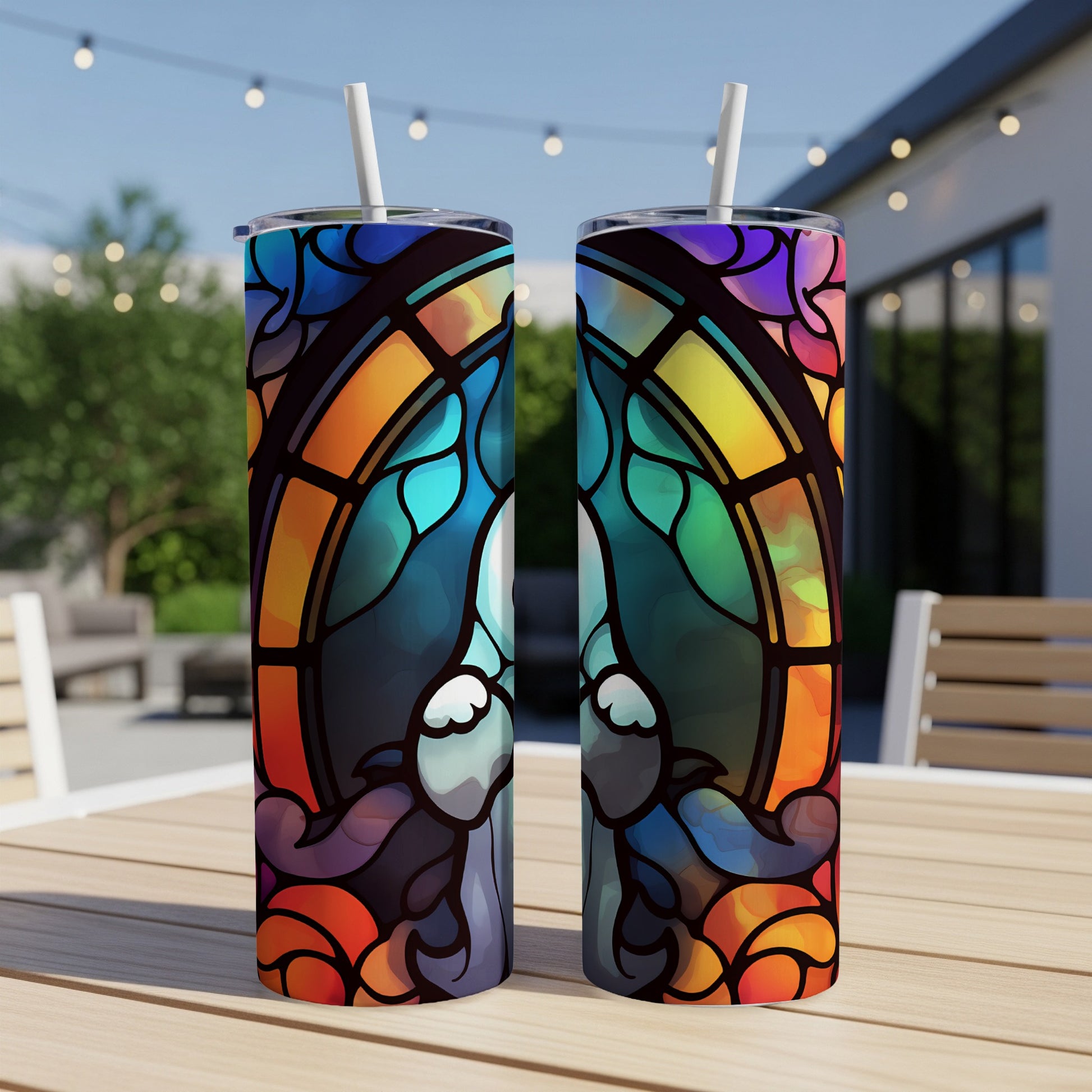 Two tumblers featuring a colorful stained-glass design of a narwhal.