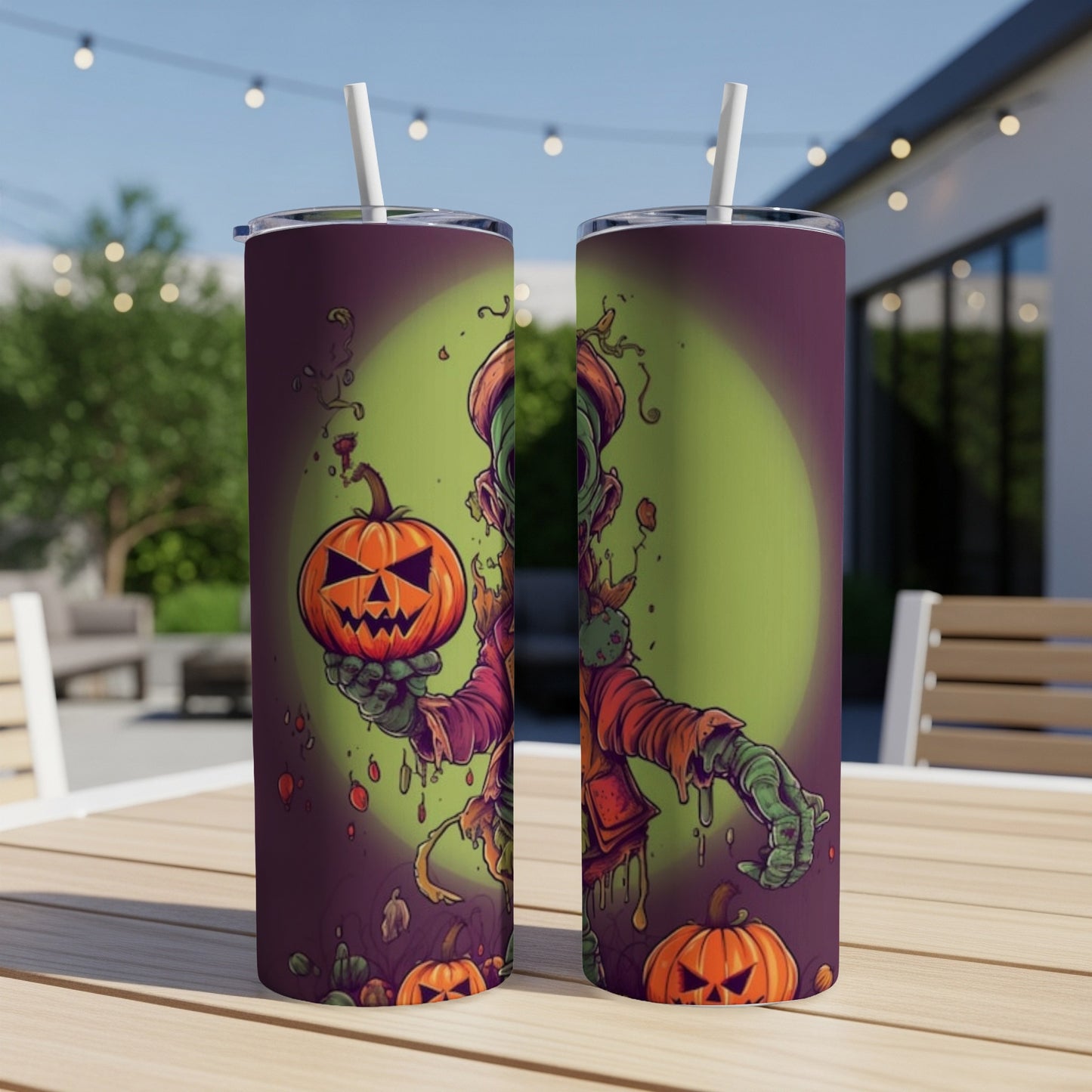 Two tumblers with a cartoon zombie holding a jack-o'-lantern and pumpkins.