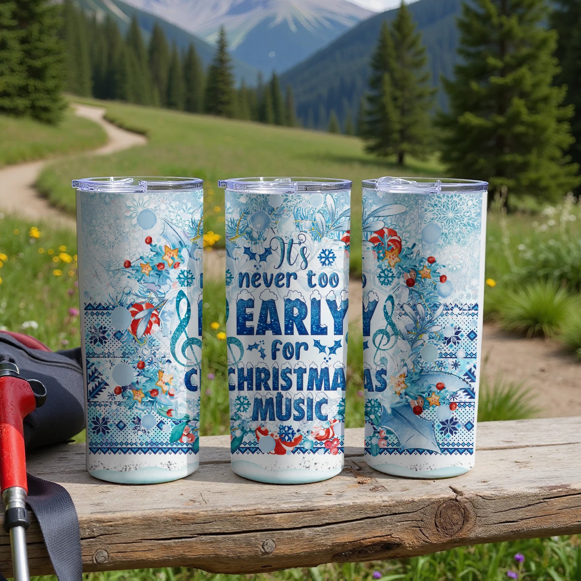 Three tumblers with "It's never too early for Christmas music" design.