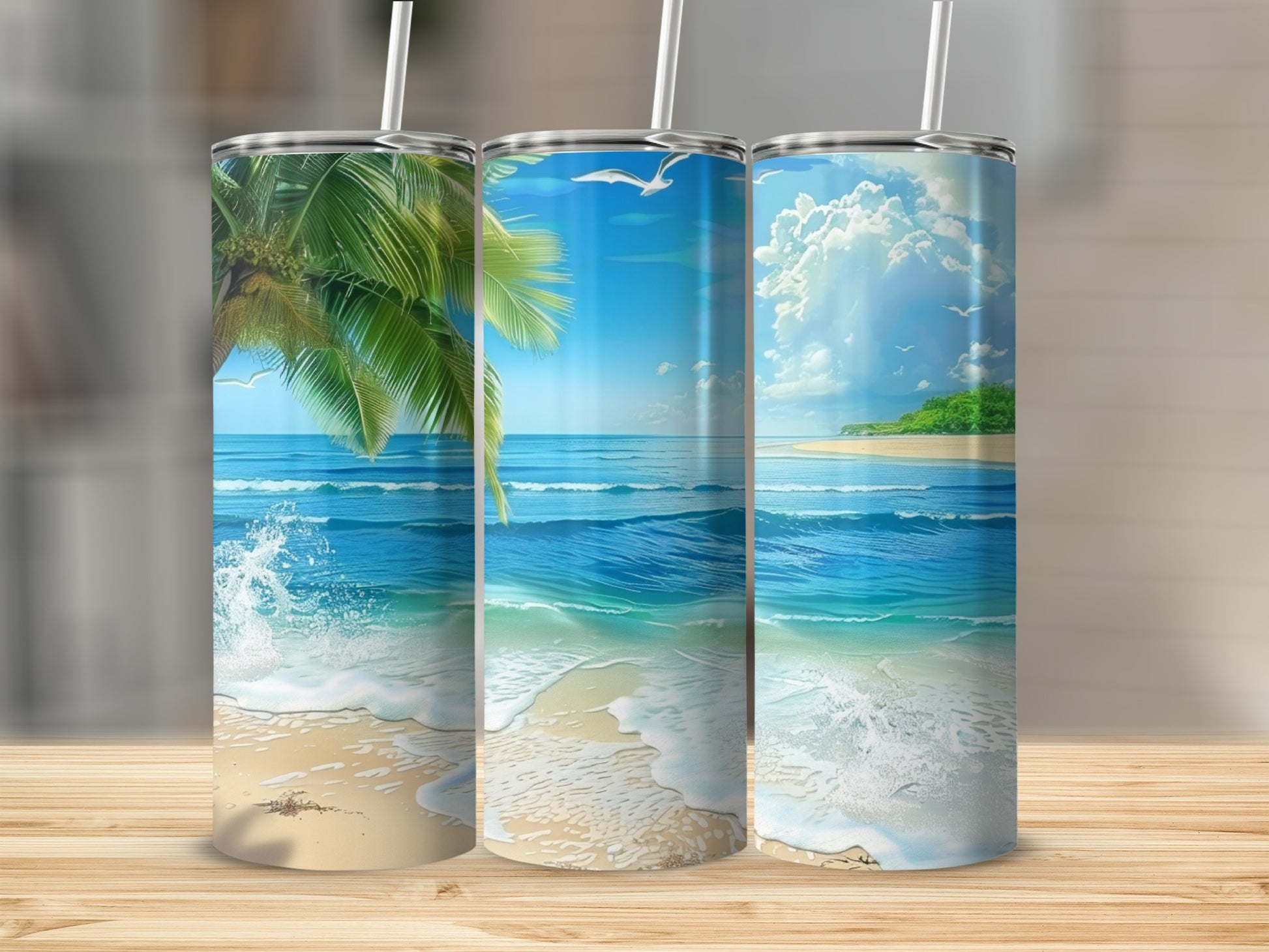 Three tumblers with tropical beach scenes and palm trees.