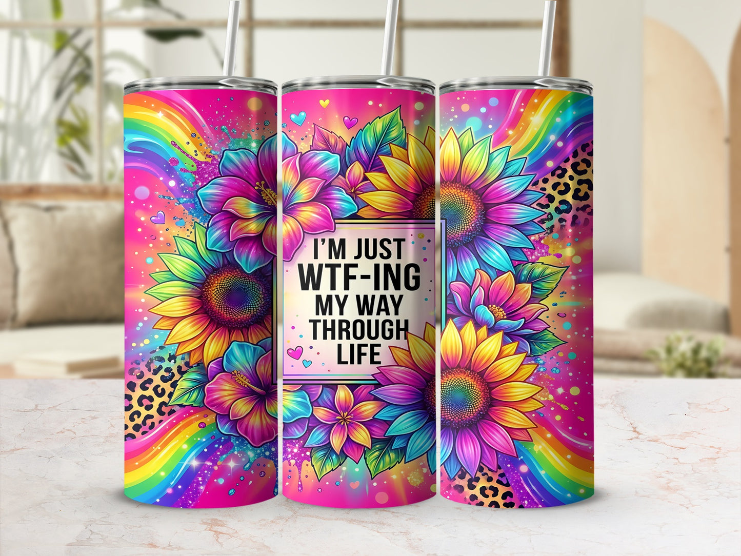 Tumbler with rainbow, floral, and leopard print, reads "I'm just WTF-ing my way through life."