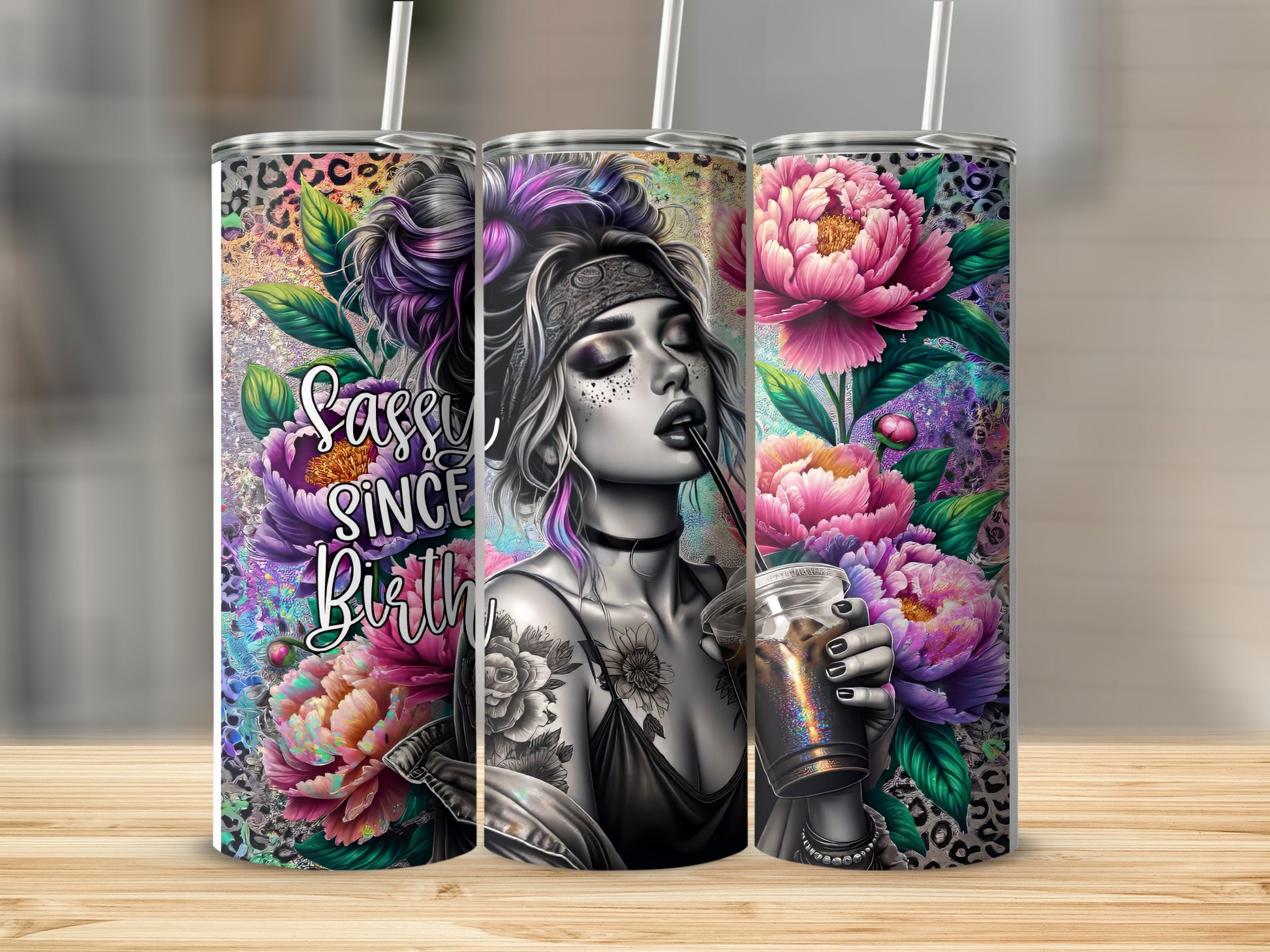 Tumbler with woman and floral design, "Sassy Since Birth" text.