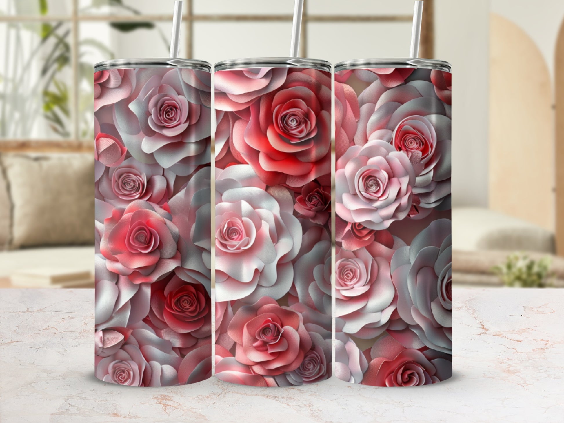 Three tumblers with a repeating pattern of pink and white roses.