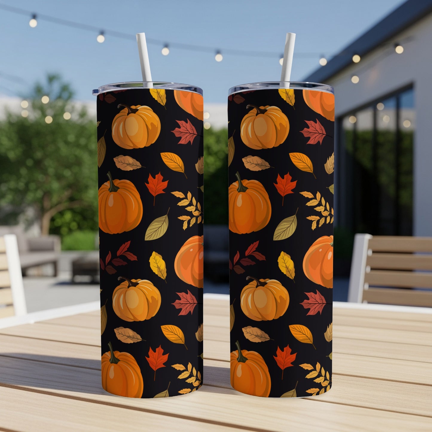 Two tumblers with a Halloween pumpkin and leaf pattern.