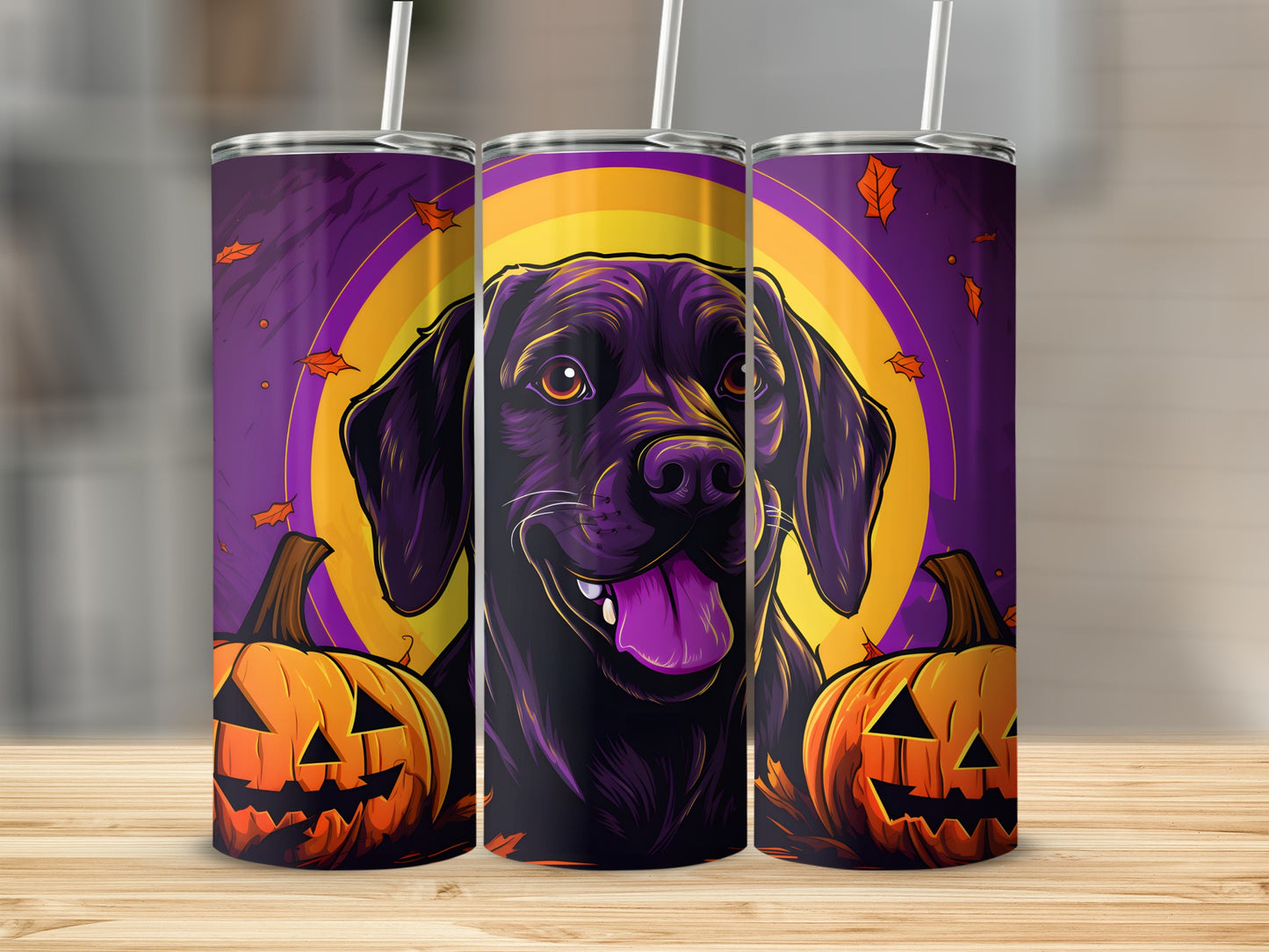 Black dog with pumpkins and autumn leaves on a Halloween themed tumbler.
