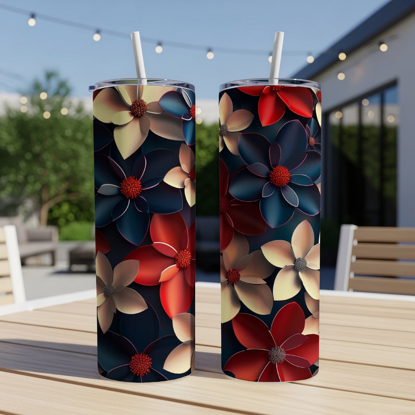 Two tumblers with a dark floral pattern featuring red, gold, and navy blue flowers.