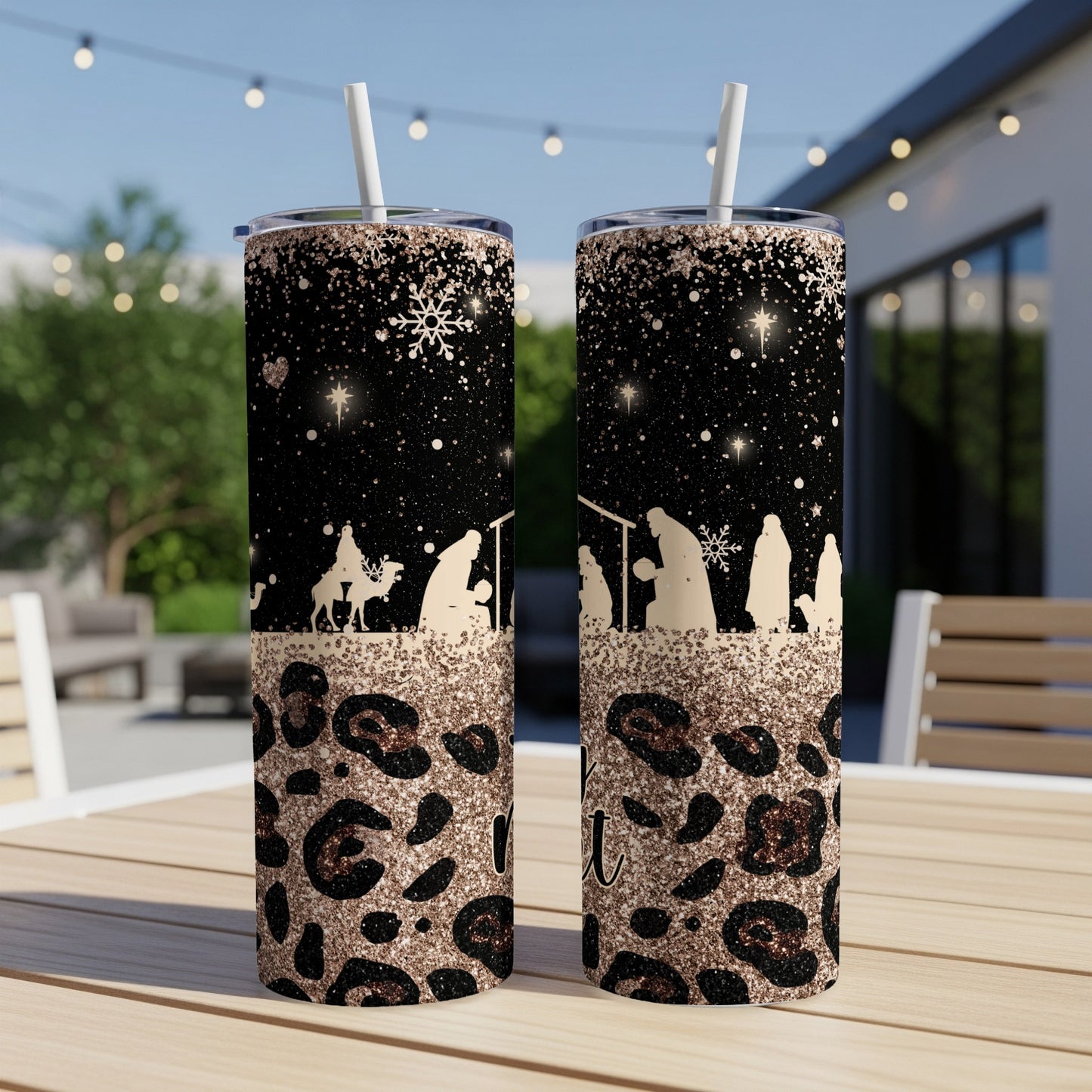 Two tall tumblers with nativity scene and leopard print design.
