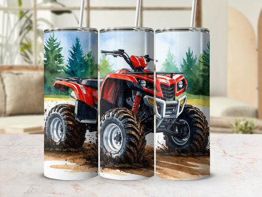 Red ATV with large tires driving through mud and dirt.