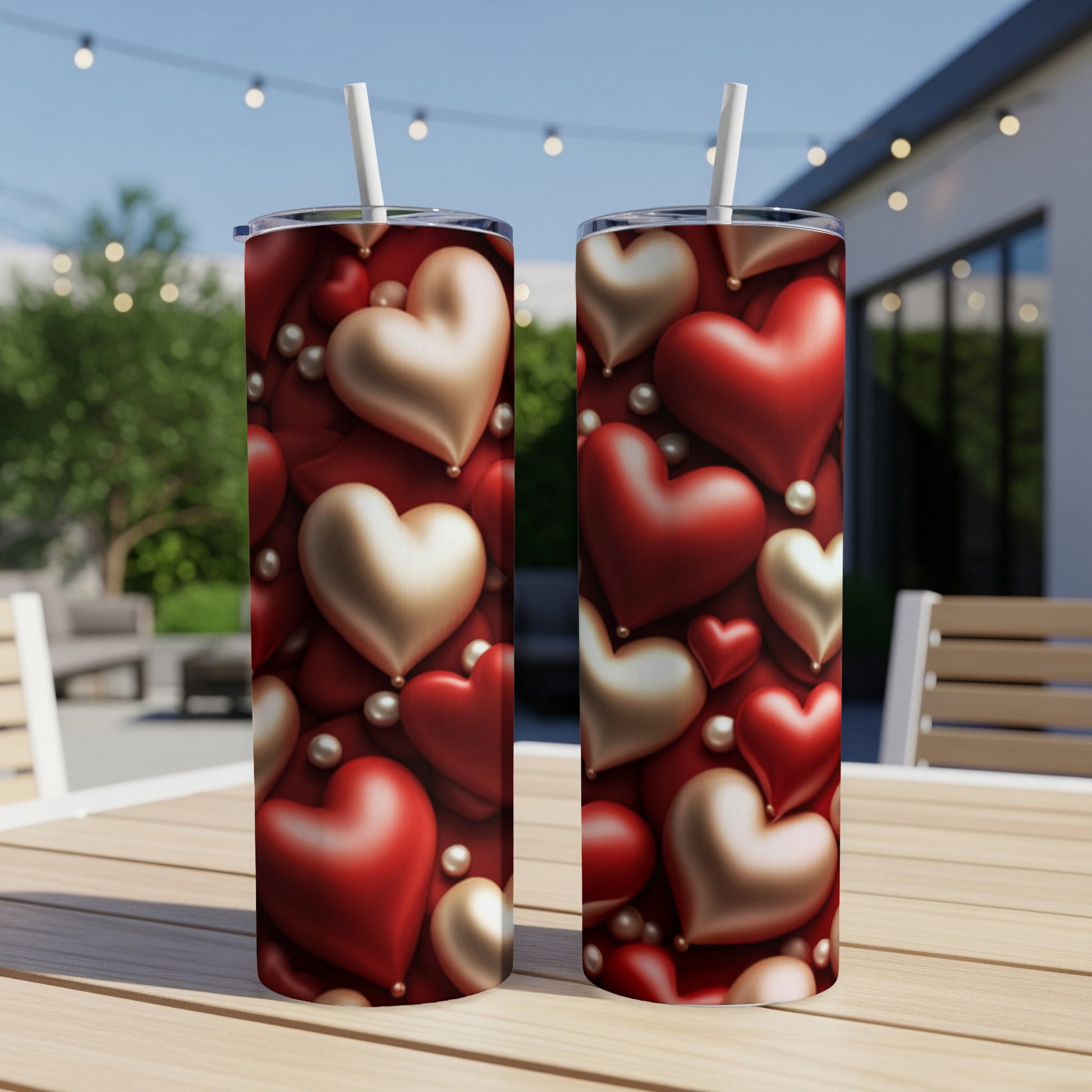 Two tumblers with red and gold hearts and pearls pattern.