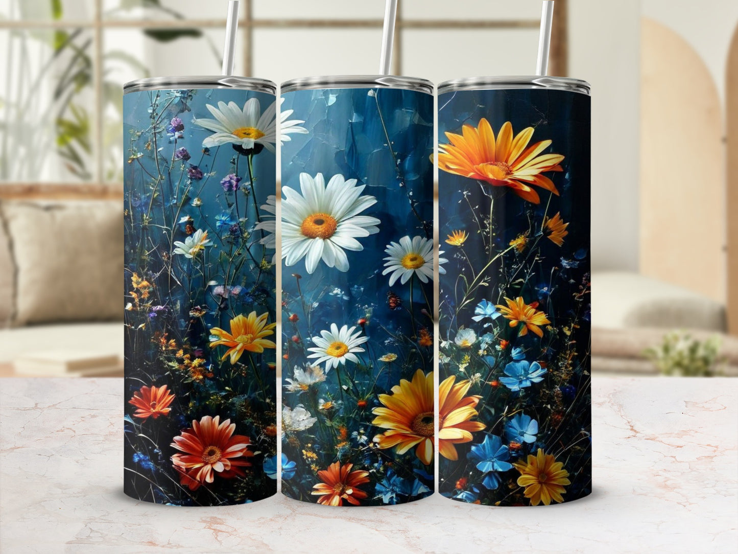 Tall tumblers with a dark blue floral background and daisy and marigold illustrations.