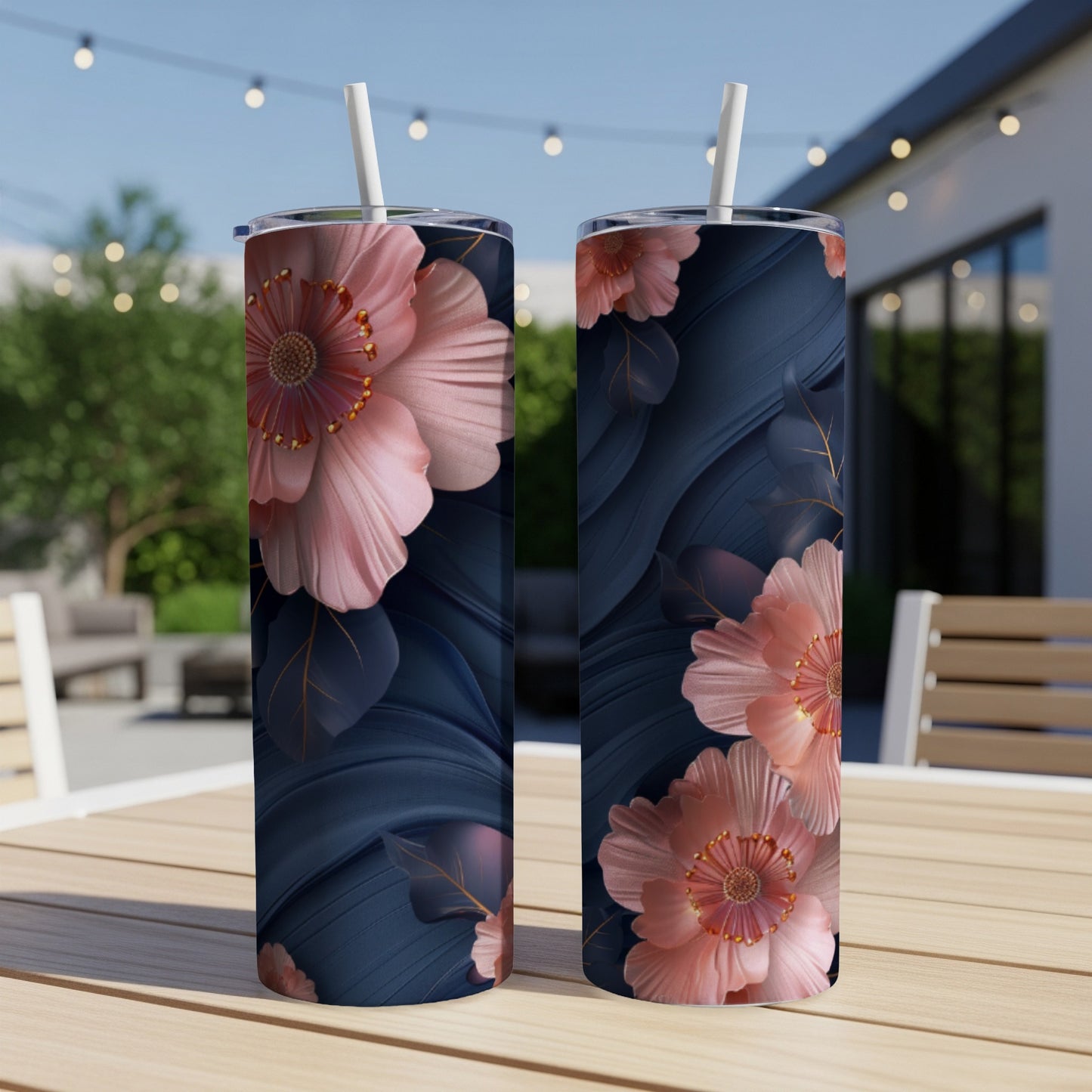 Two tall tumblers with pink floral and navy leaf pattern.