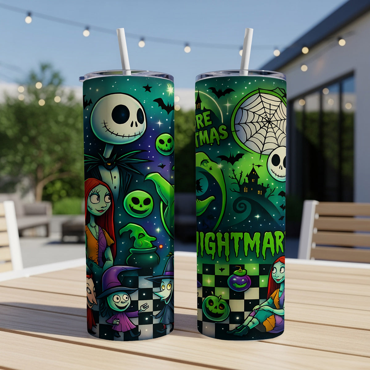 Two tumblers with Nightmare Before Christmas characters and text on a table outdoors.