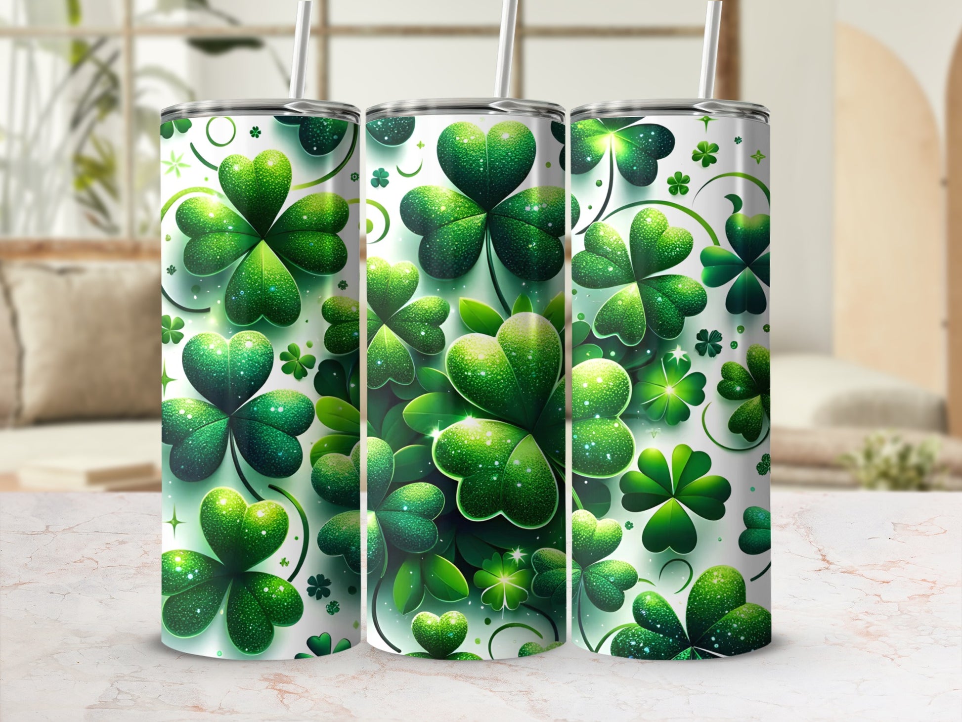 Three green shamrock patterned tumblers with straws.