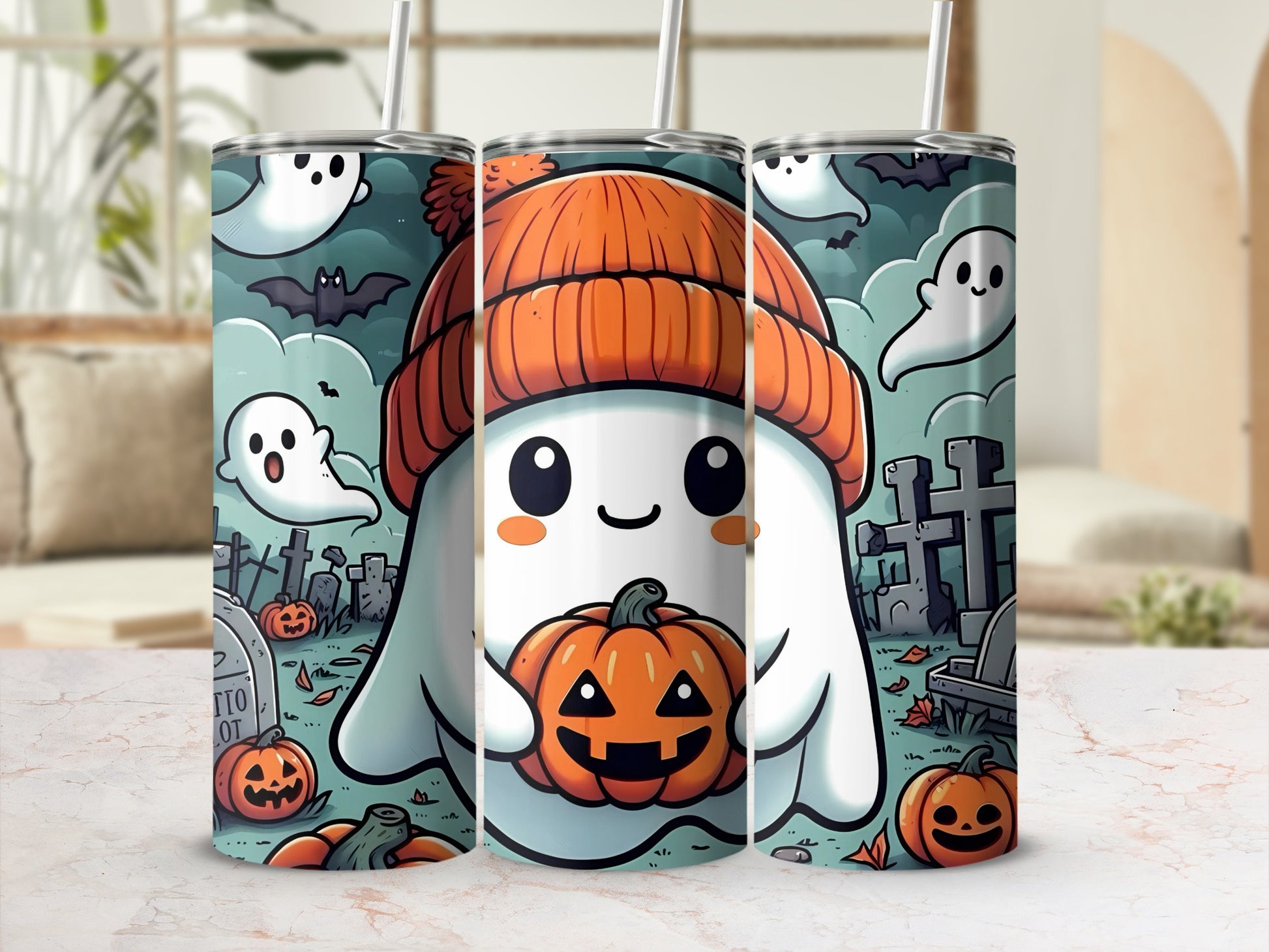 Three tumblers with a cute ghost, pumpkin, bats, and graveyard Halloween theme.