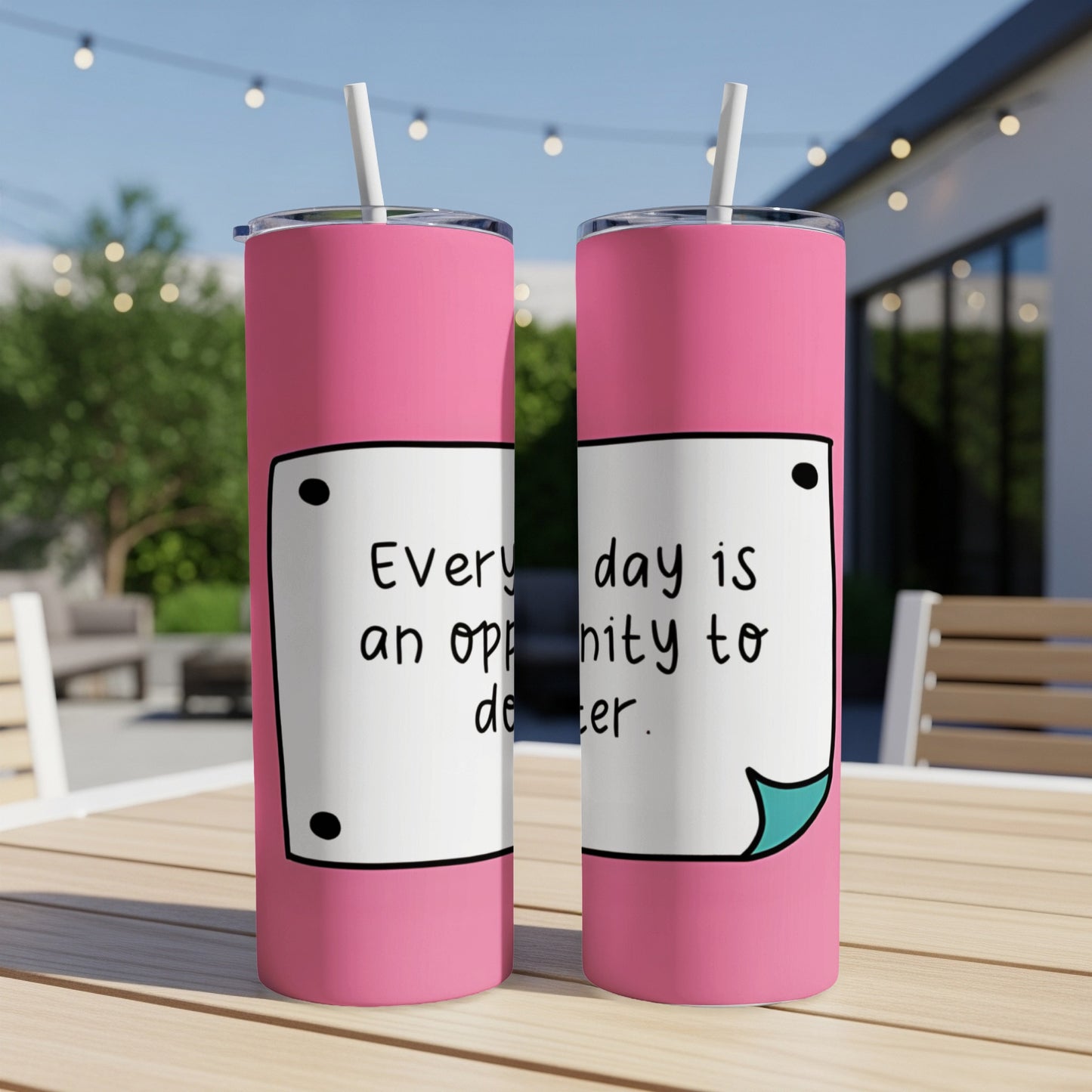 Pink tumbler with "Every day is an opportunity to de ter." text.