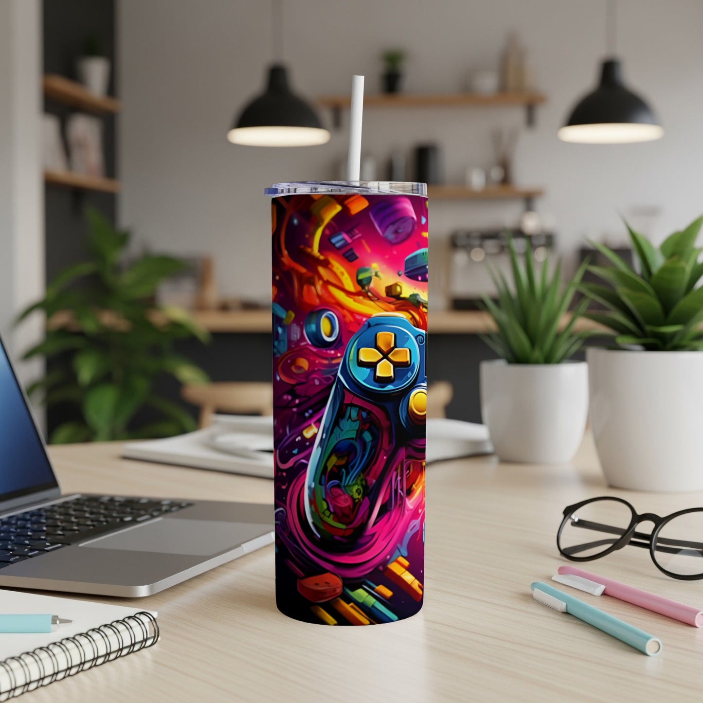 Tumbler with a colorful abstract video game controller design.