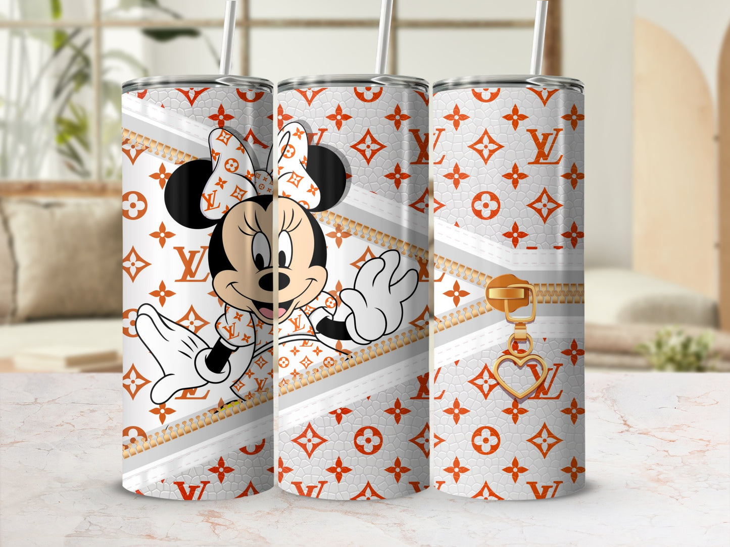 Minnie Mouse pattern on three tumblers with gold zipper charm and heart.