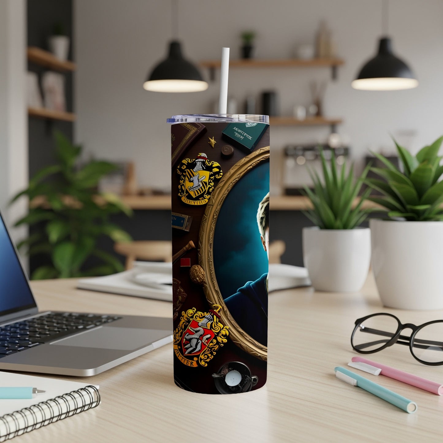 Harry Potter Hogwarts houses tumbler with character portrait and wizarding items.