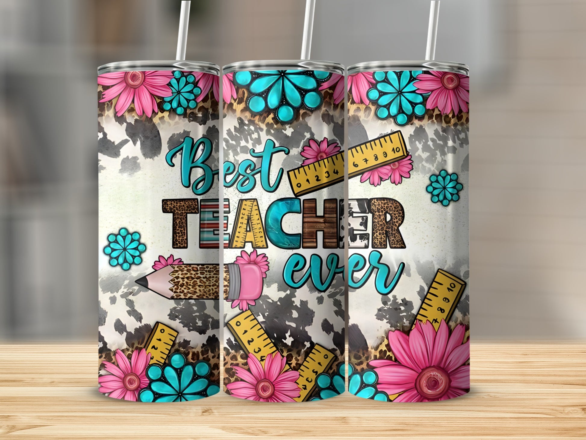 Cow print tumbler with "Best Teacher Ever" text and floral accents.
