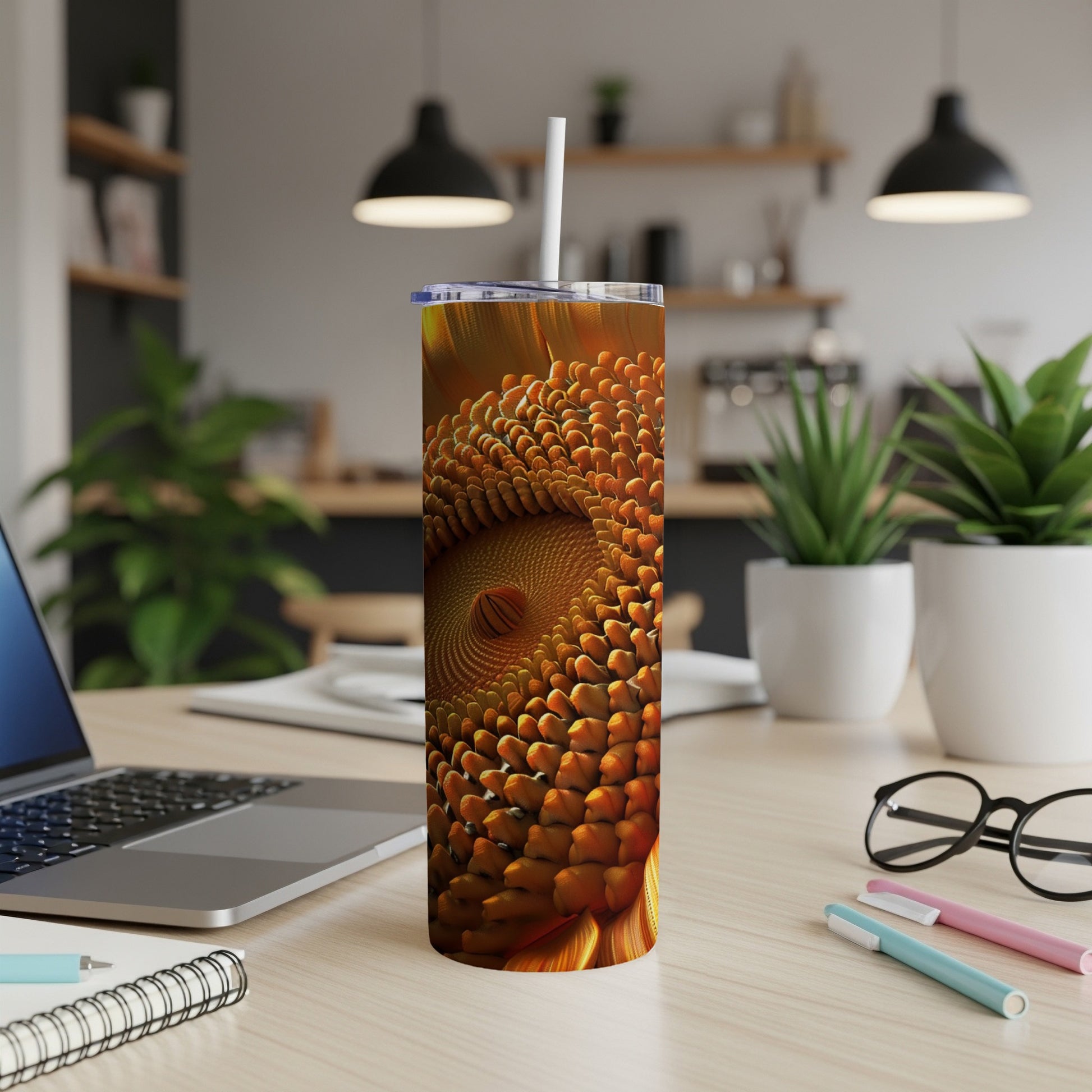 Tumbler with intricate fractal pattern in warm orange and brown tones.