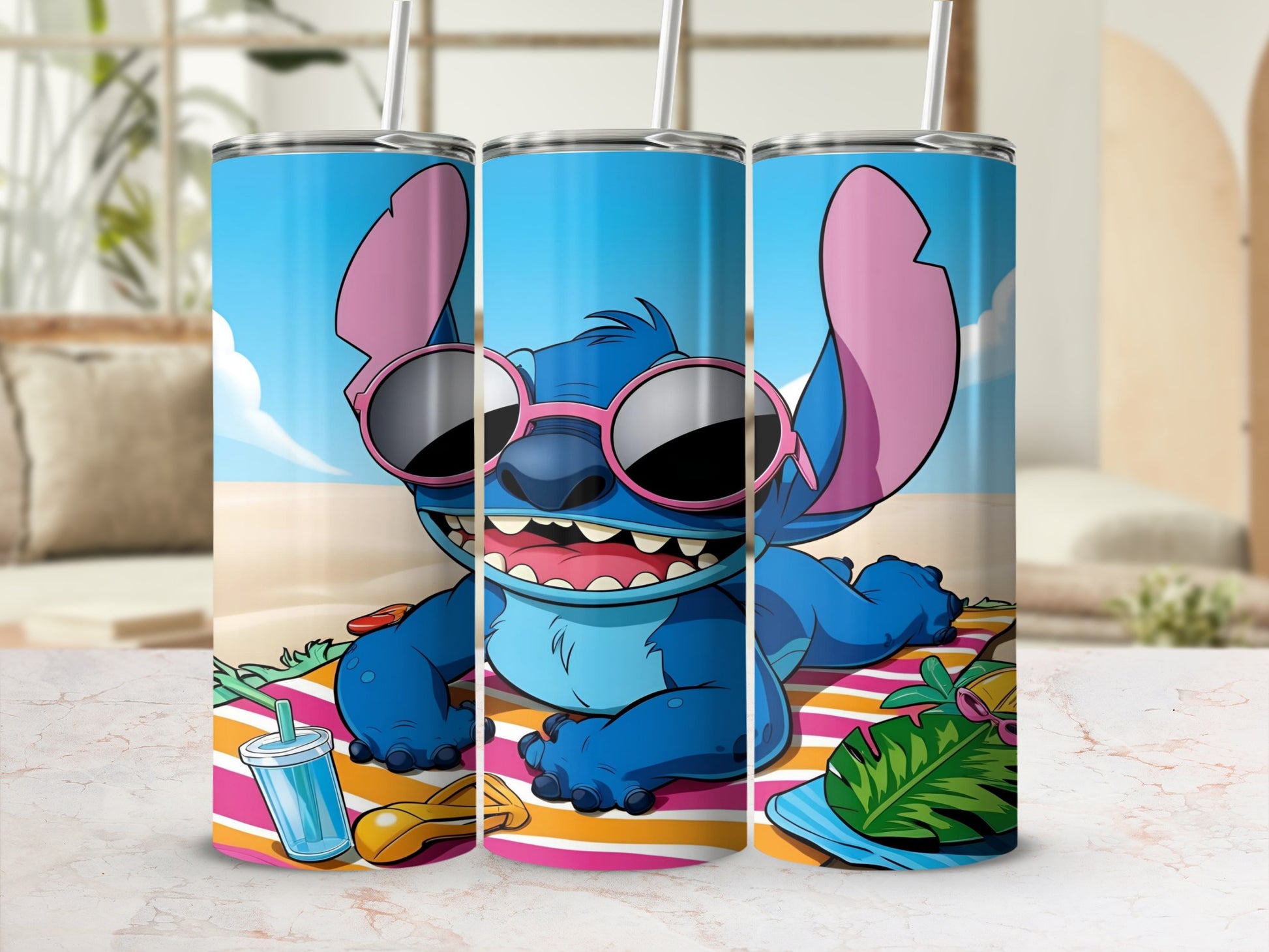 Stitch wearing sunglasses and lying on a striped towel on a beach.