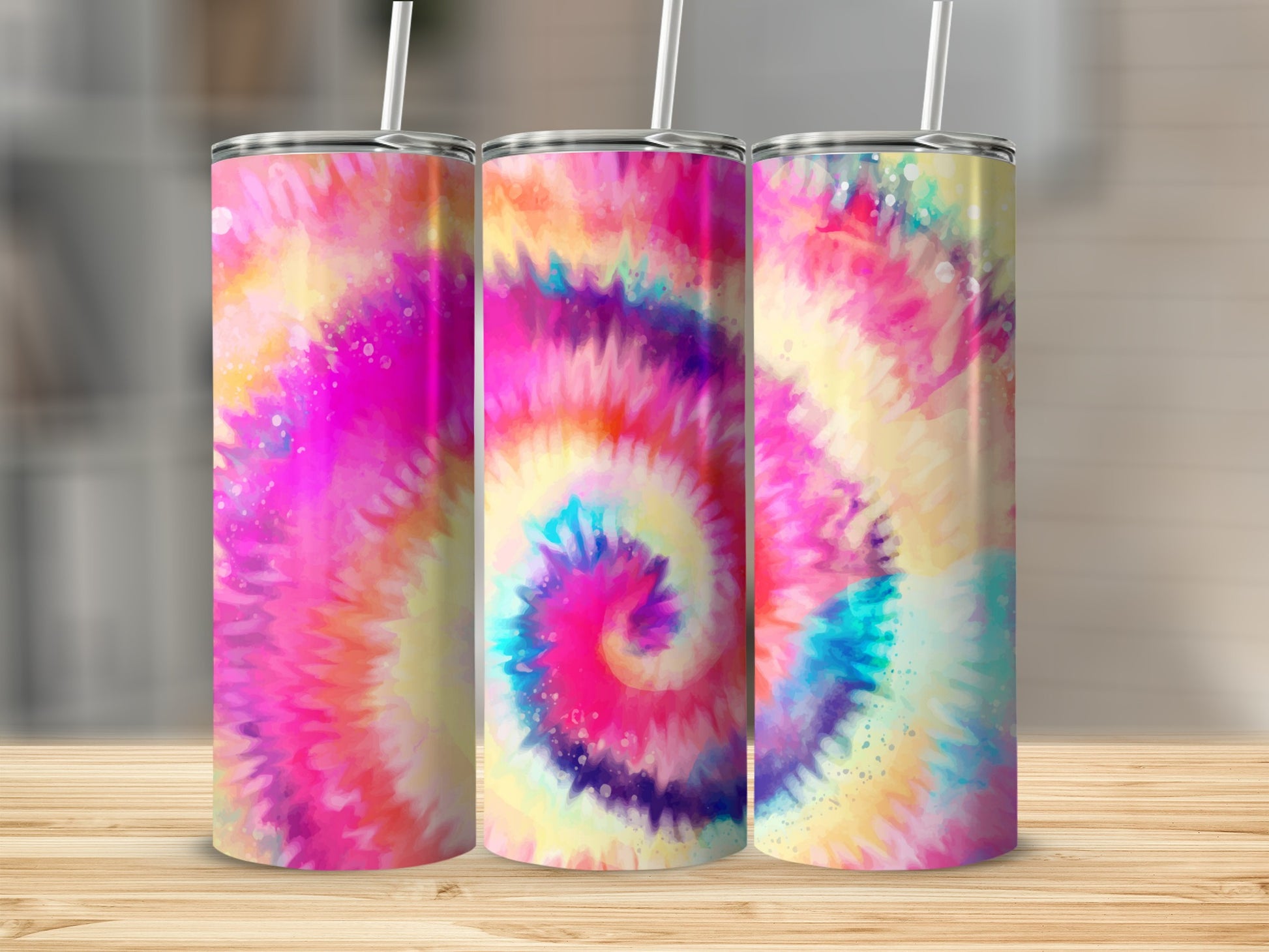 Three tumblers with a colorful tie-dye pattern featuring pink, purple, yellow, and blue.