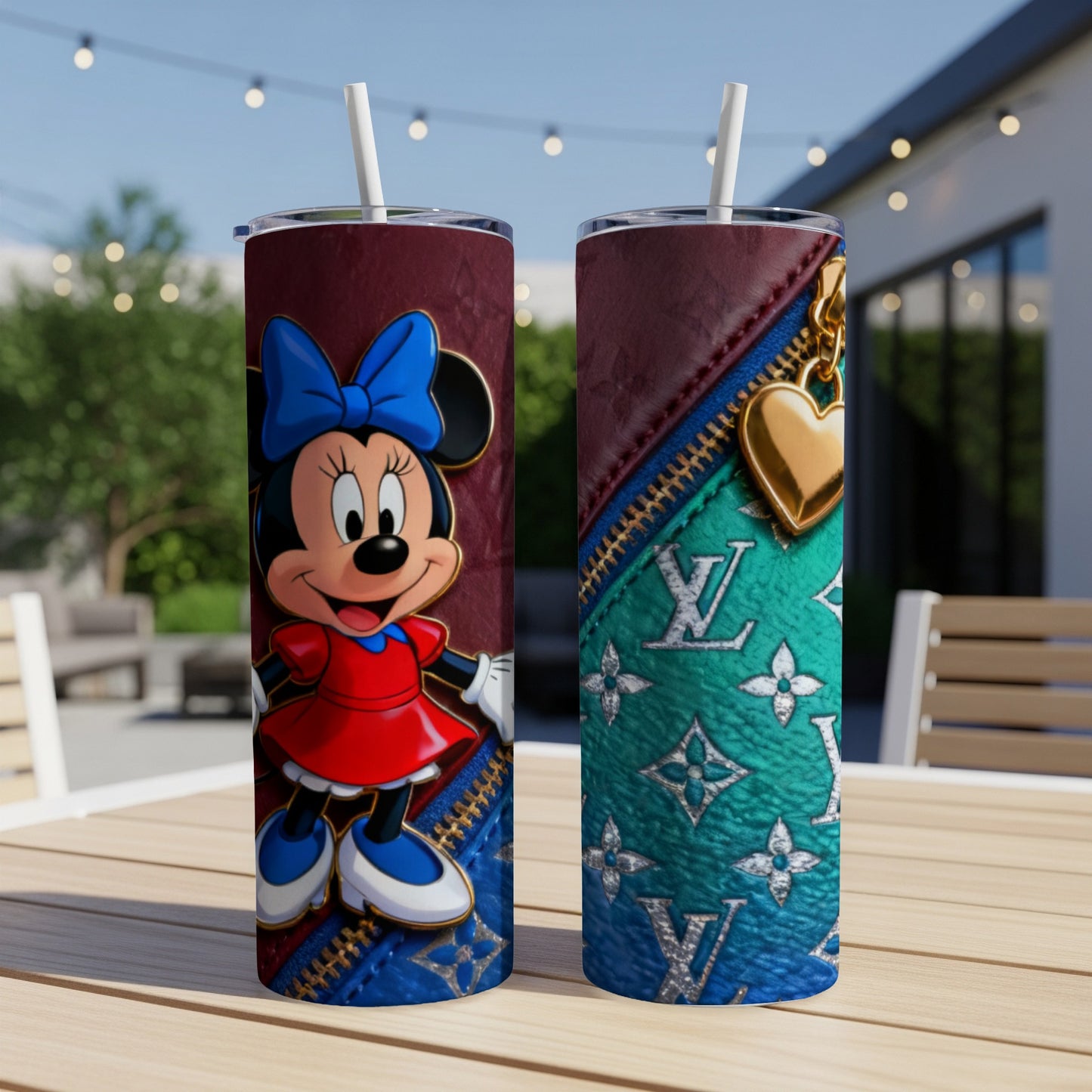 Minnie Mouse on a red and teal Louis Vuitton print tumbler with a gold heart charm.