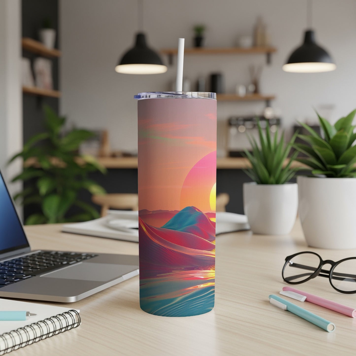 Abstract sunset over colorful desert landscape on a skinny tumbler.