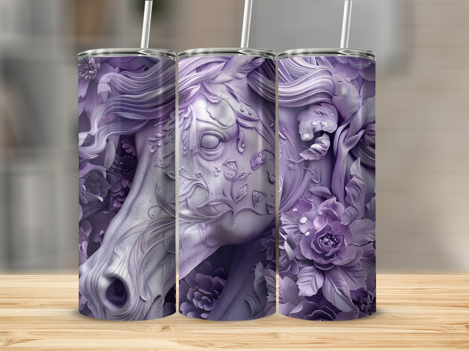 Purple floral horse head design on a set of three tumblers.
