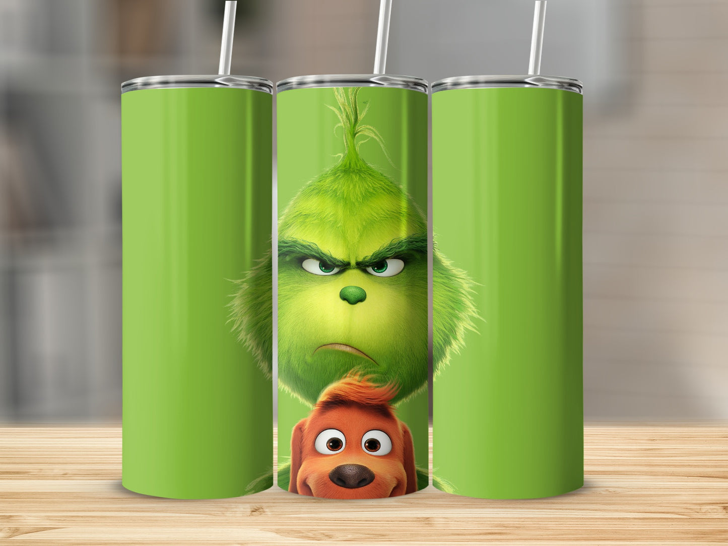 The Grinch and Max the dog on a bright green tumbler.